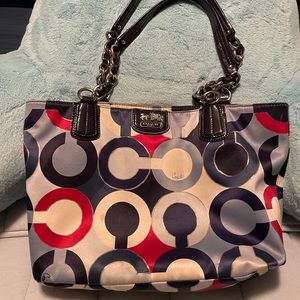 Well loved Authentic Coach bag in red, white & blue